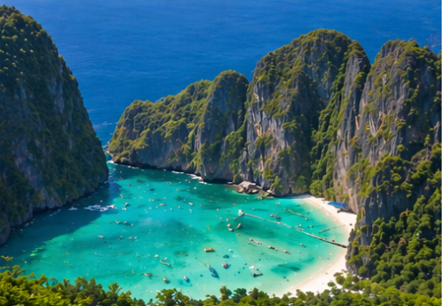 Phi Phi Islands Maya Bay aerial view with turquoise sea and limestone cliffs